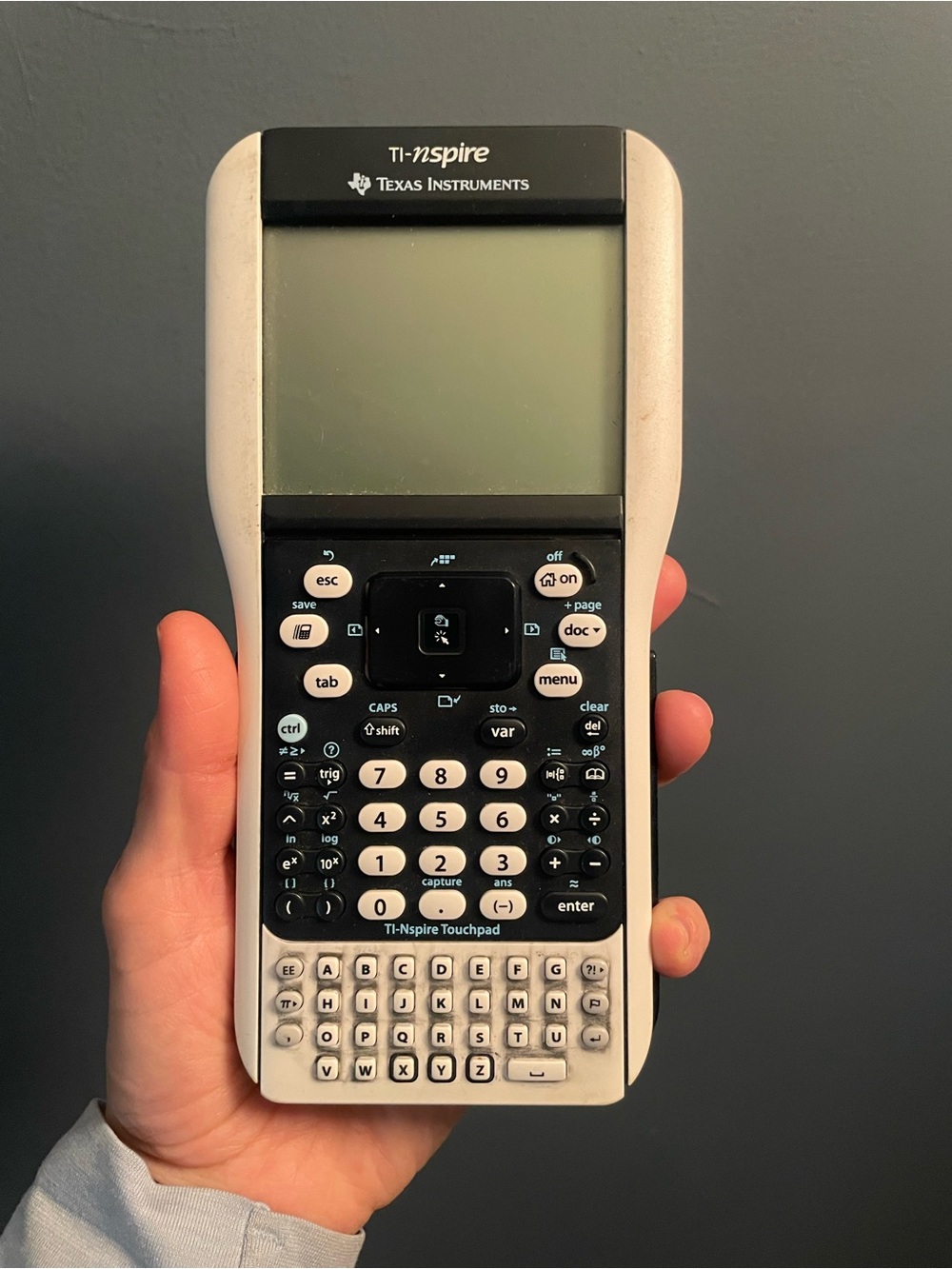 Texas Instruments TI‑Nspire Graphing Calculator in White and Black (no battery)
